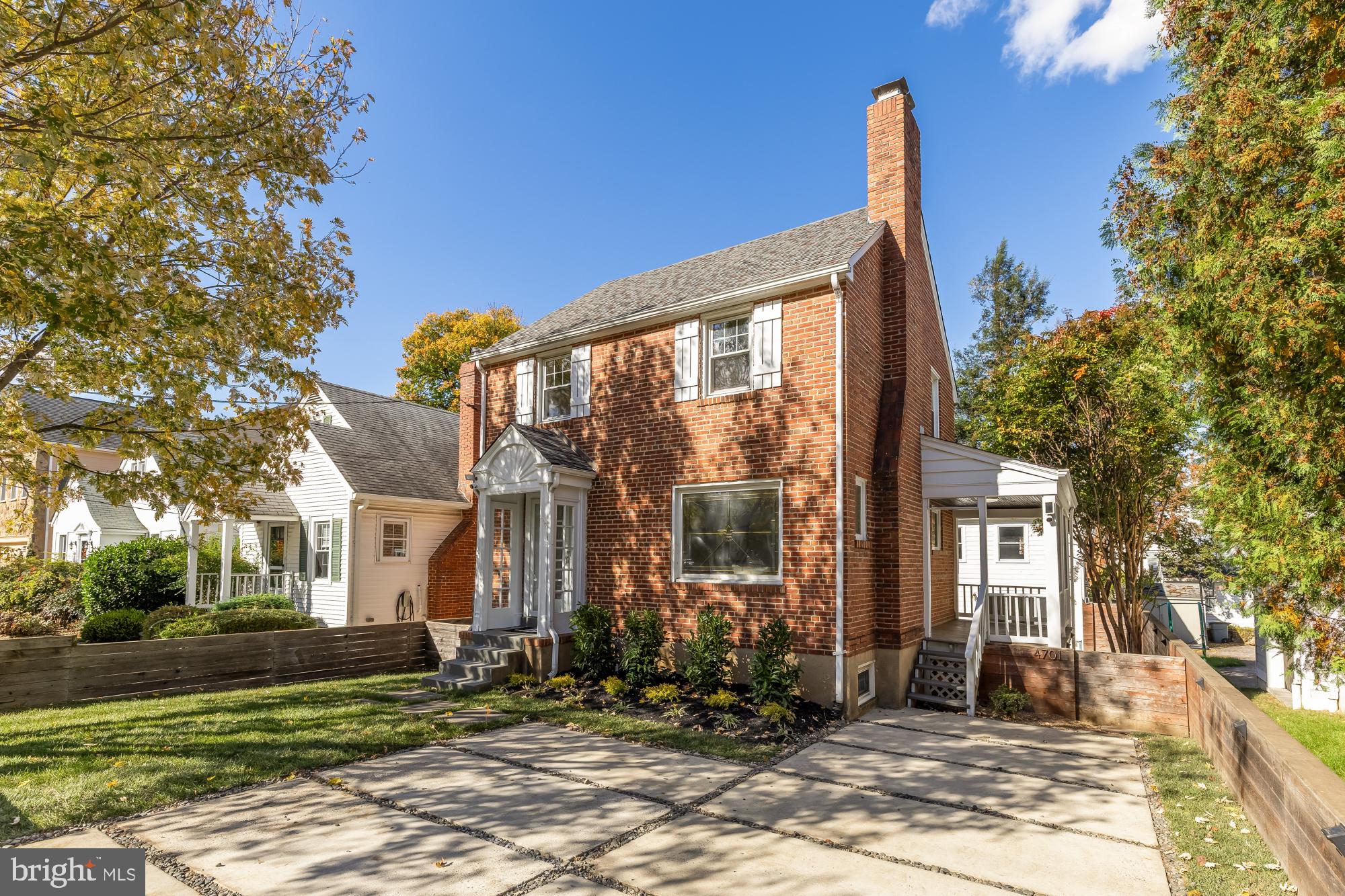 4701 Rosedale Avenue Bethesda, MD 20814 - Photo 1 of 43 a front view of a house with a yard