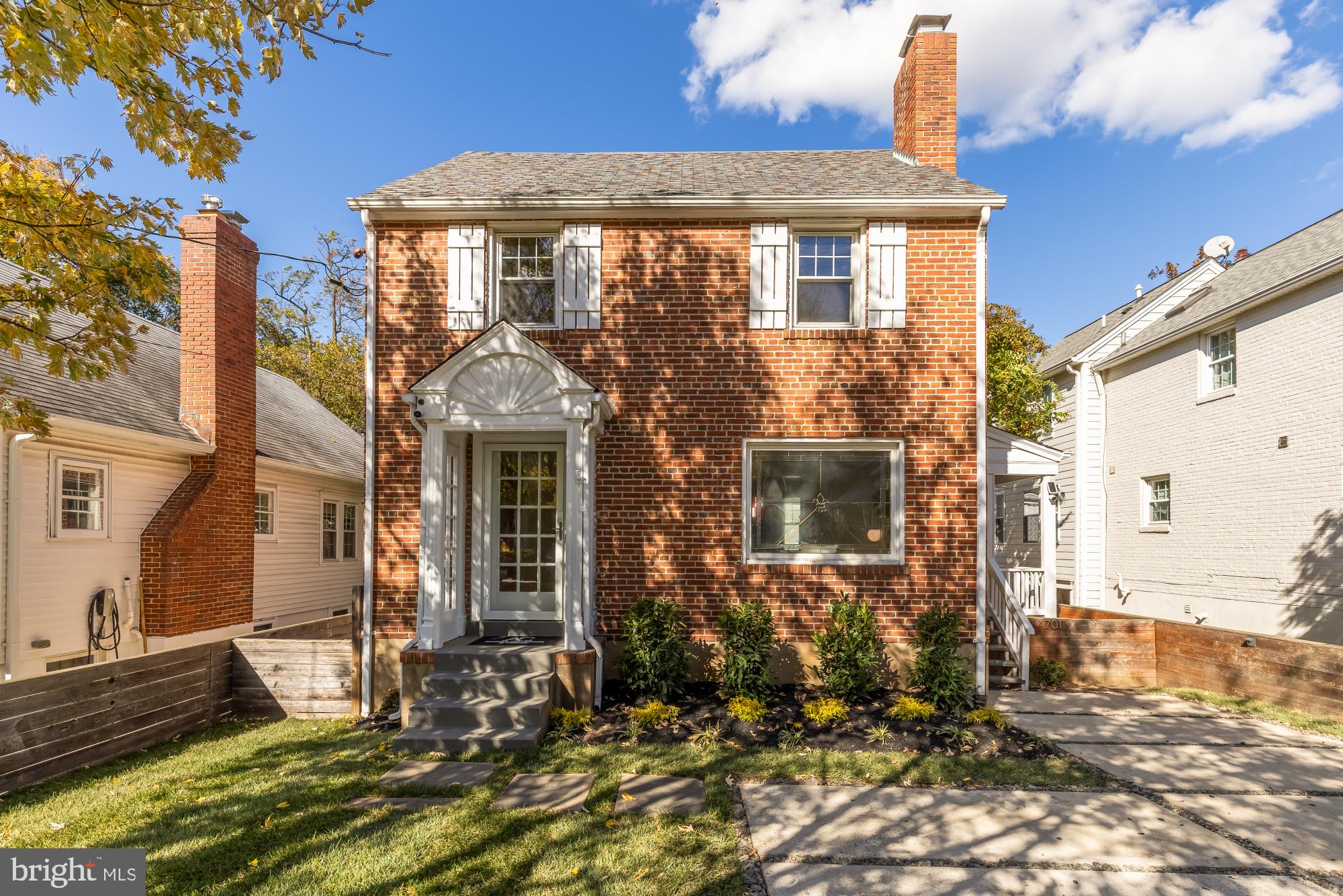 4701 Rosedale Avenue Bethesda, MD 20814 - Photo 2 of 43 a front view of a house with a yard