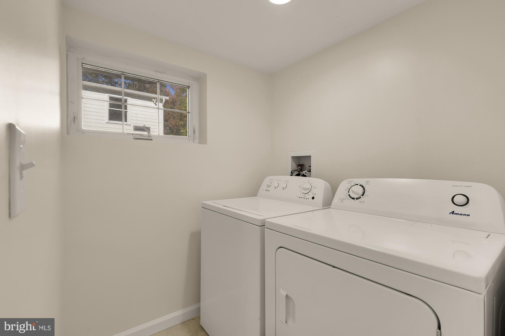 4701 Rosedale Avenue Bethesda, MD 20814 - Photo 22 of 43 a utility room with dryer and washer