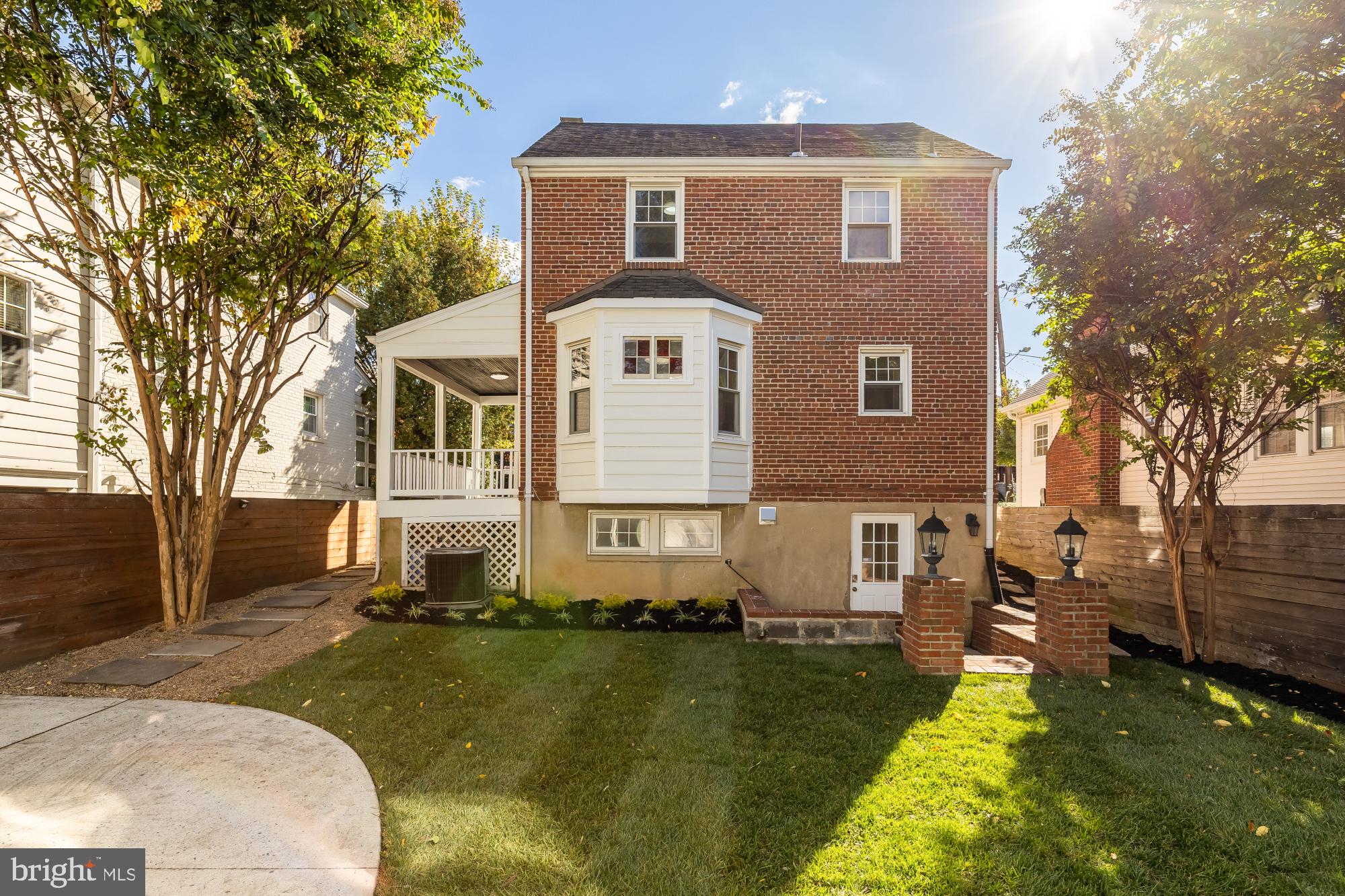 4701 Rosedale Avenue Bethesda, MD 20814 - Photo 23 of 43 a front view of a house with a yard