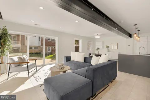 a bathroom with a shower a toilet and a sink