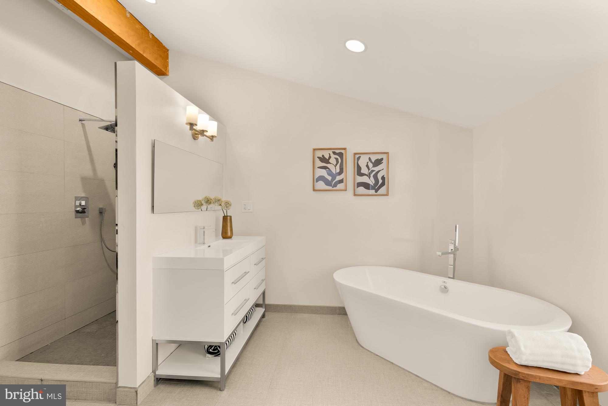 4701 Rosedale Avenue Bethesda, MD 20814 - Photo 40 of 43 a white bath tub sitting next to a white toilet