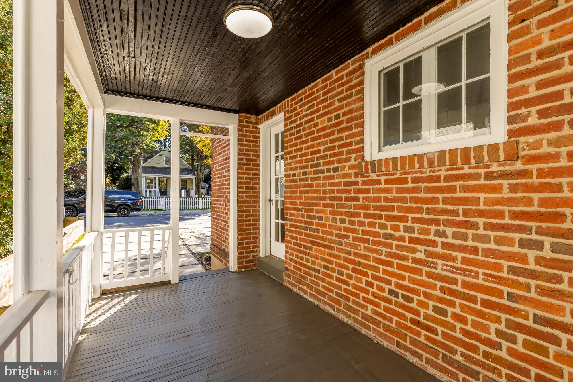 4701 Rosedale Avenue Bethesda, MD 20814 - Photo 7 of 43 a view of front door of house with wooden floor