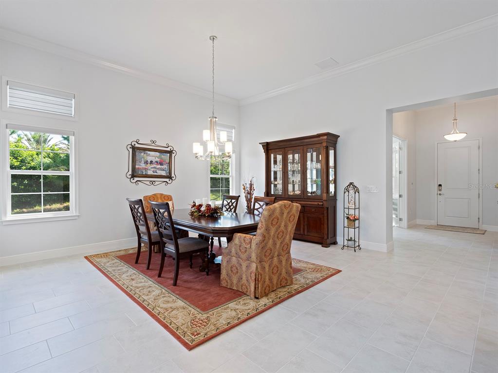 2600 Meadowedge Loop St. Cloud, FL 34772 - Photo 14 of 82 a view of a dining room with furniture