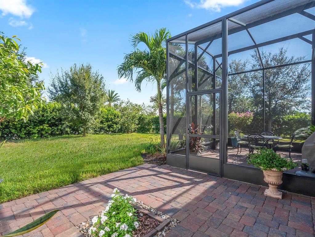 2600 Meadowedge Loop St. Cloud, FL 34772 - Photo 21 of 82 a backyard of a house with lots of green space