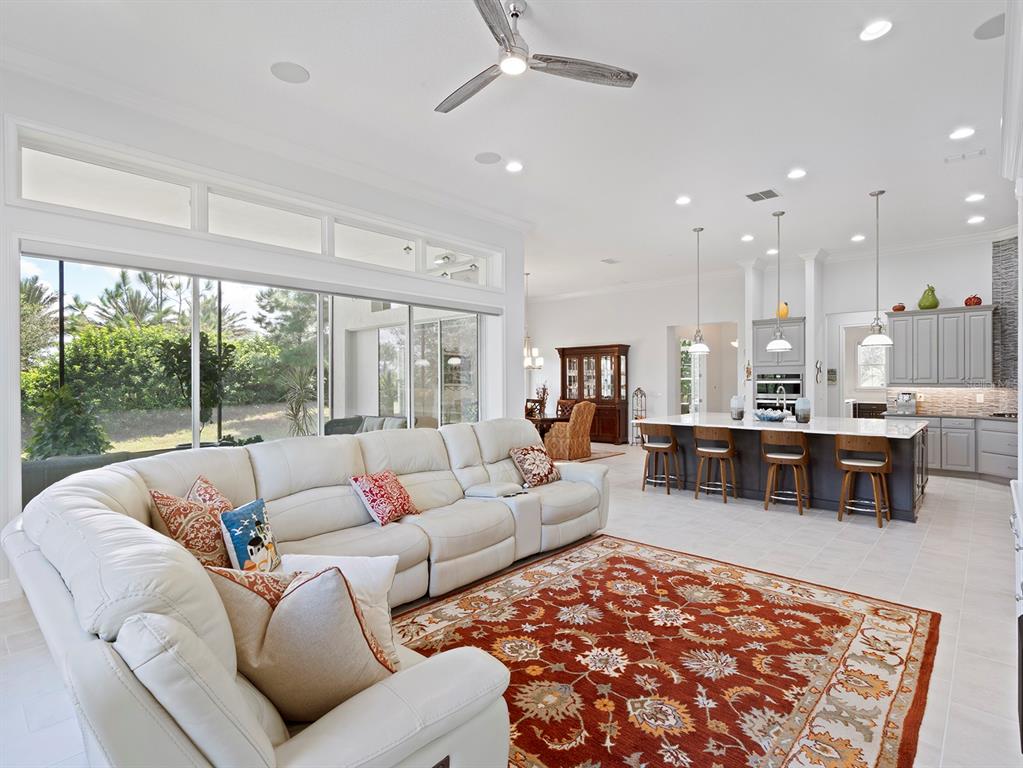 2600 Meadowedge Loop St. Cloud, FL 34772 - Photo 28 of 82 a living room with furniture and a large window