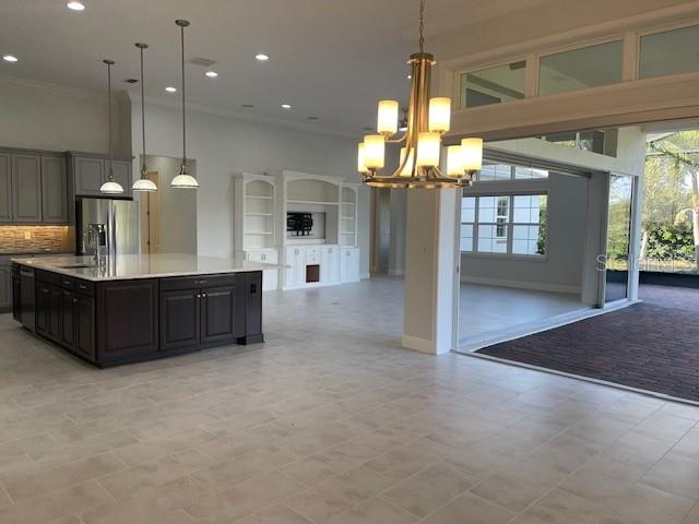 2600 Meadowedge Loop St. Cloud, FL 34772 - Photo 29 of 82 a view of a kitchen with a sink and window