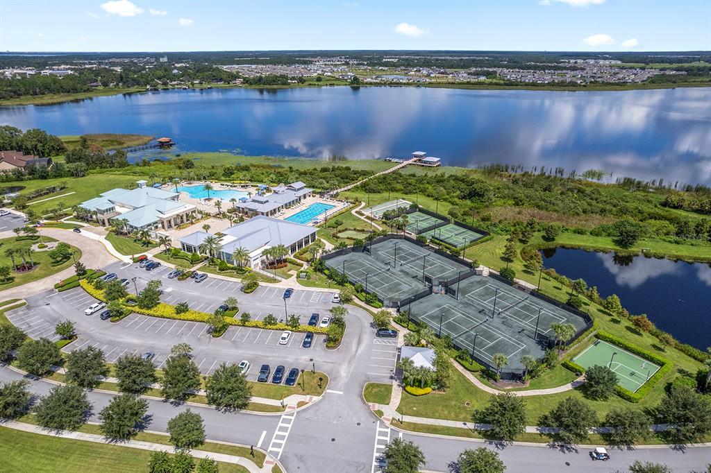 2600 Meadowedge Loop St. Cloud, FL 34772 - Photo 67 of 82 an aerial view of residential building with outdoor space and lake view
