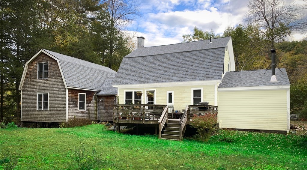 664 Main Road Chesterfield, MA 01012 - Photo 2 of 22 a front view of a house with garden