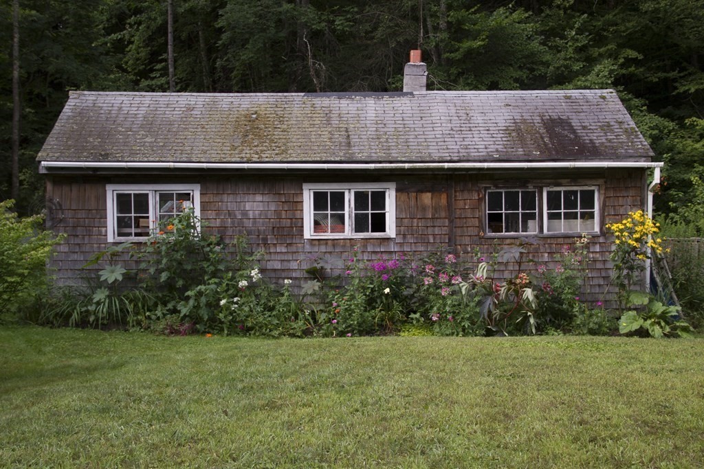 664 Main Road Chesterfield, MA 01012 - Photo 22 of 22 a view of a house with garden and yard