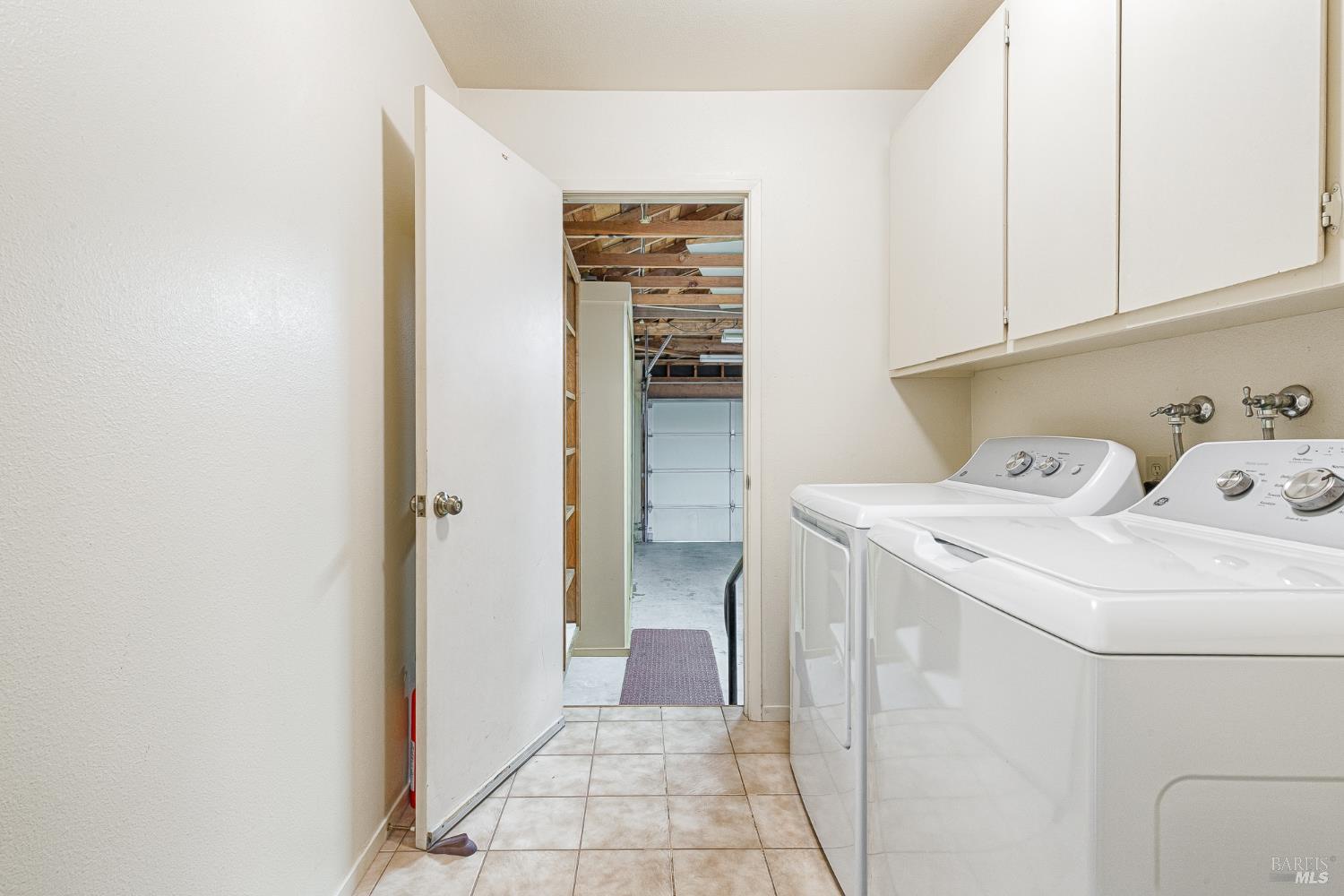 138 Oak Shadow Drive Santa Rosa, CA 95409 - Photo 27 of 50 a utility room with dryer and washer