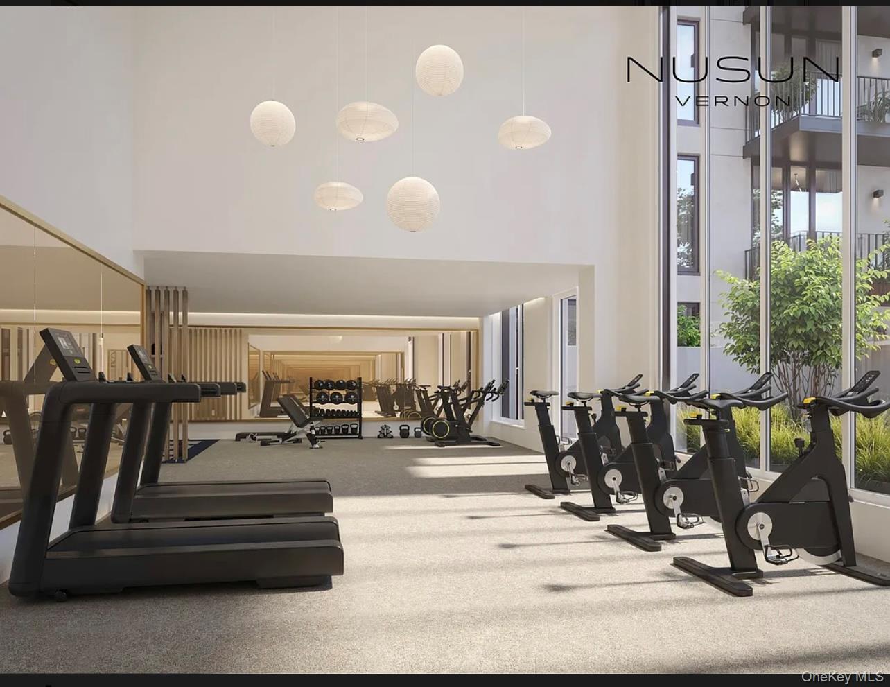30-55 Vernon Boulevard, Unit 6G Queens, NY 11102 - Photo 14 of 16 a view of a room with gym equipment