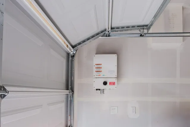 a view of storage and utility room with racks on the wall
