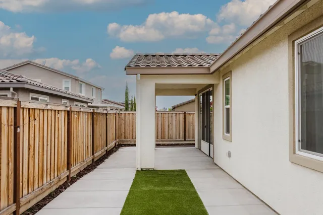 a view of a porch with a yard
