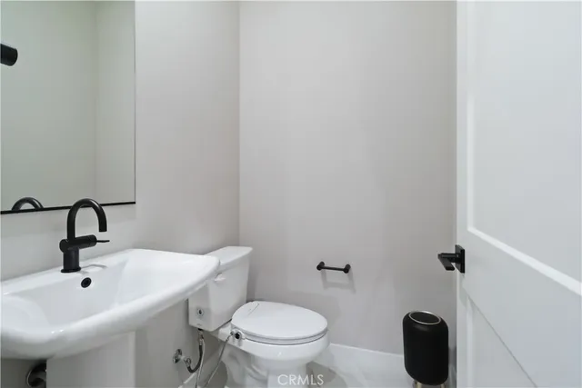 wooden floor with white walls