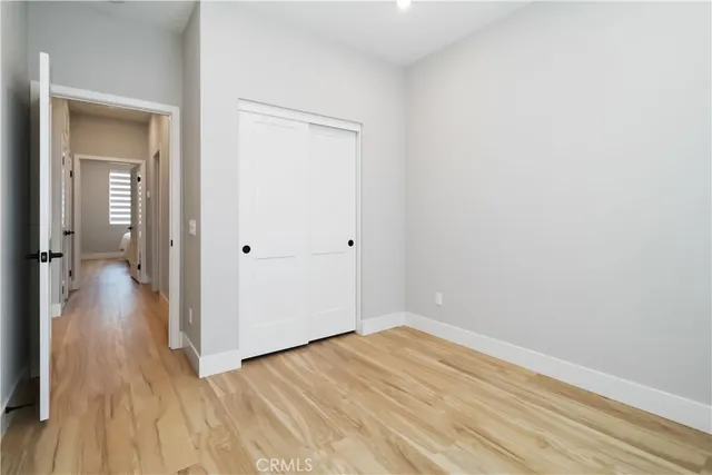 a view of a bathroom from a hallway