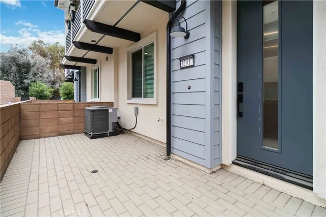 a view of entryway with a brick wall