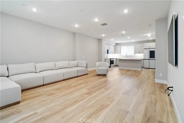 a living room with a couch and a flat screen tv