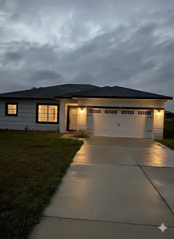 a view of outdoor space with deck and yard