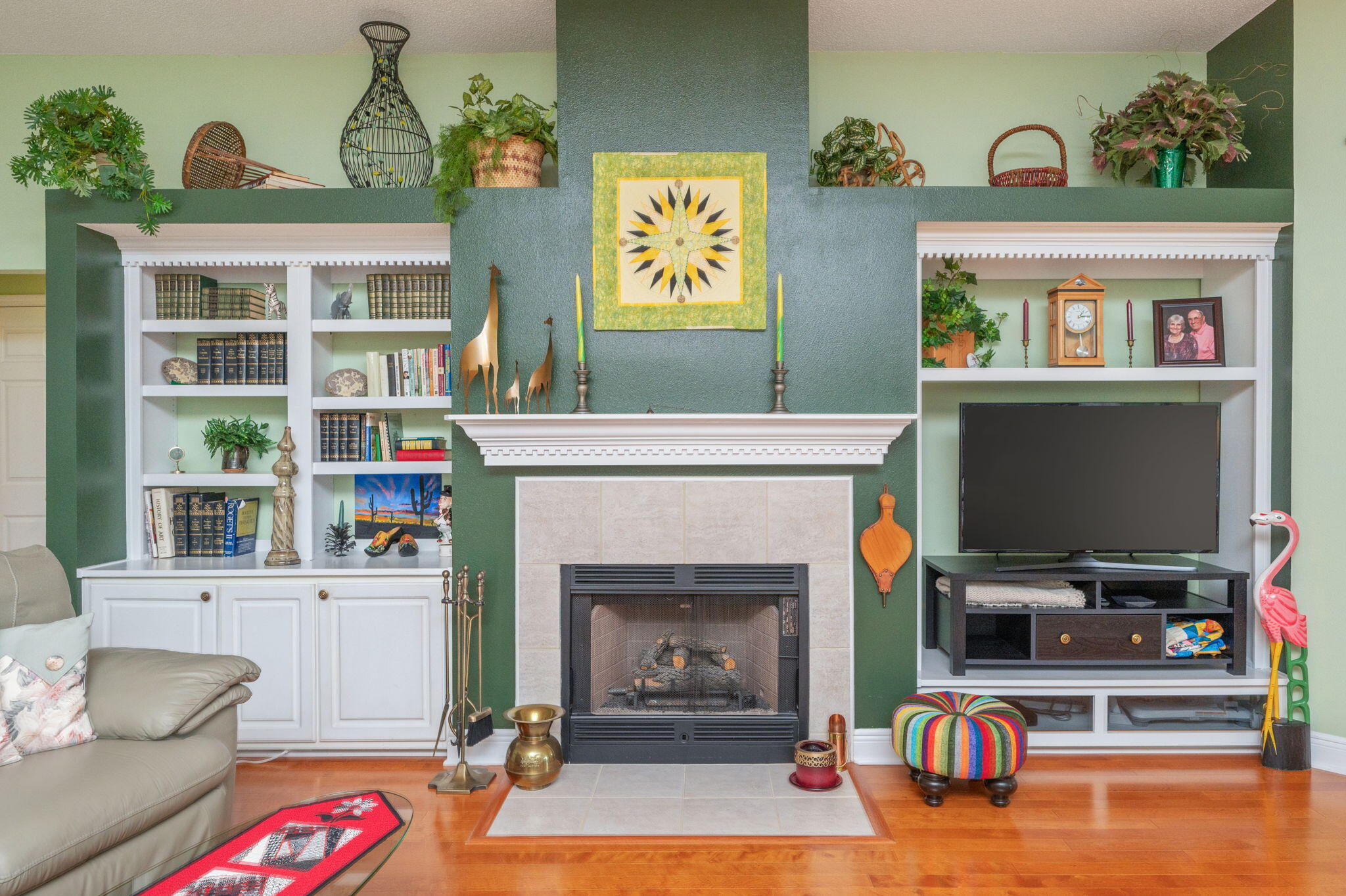 5863 Hunting Meadows Drive Crestview, FL 32536 - Photo 12 of 49 a living room with fireplace furniture and a flat screen tv