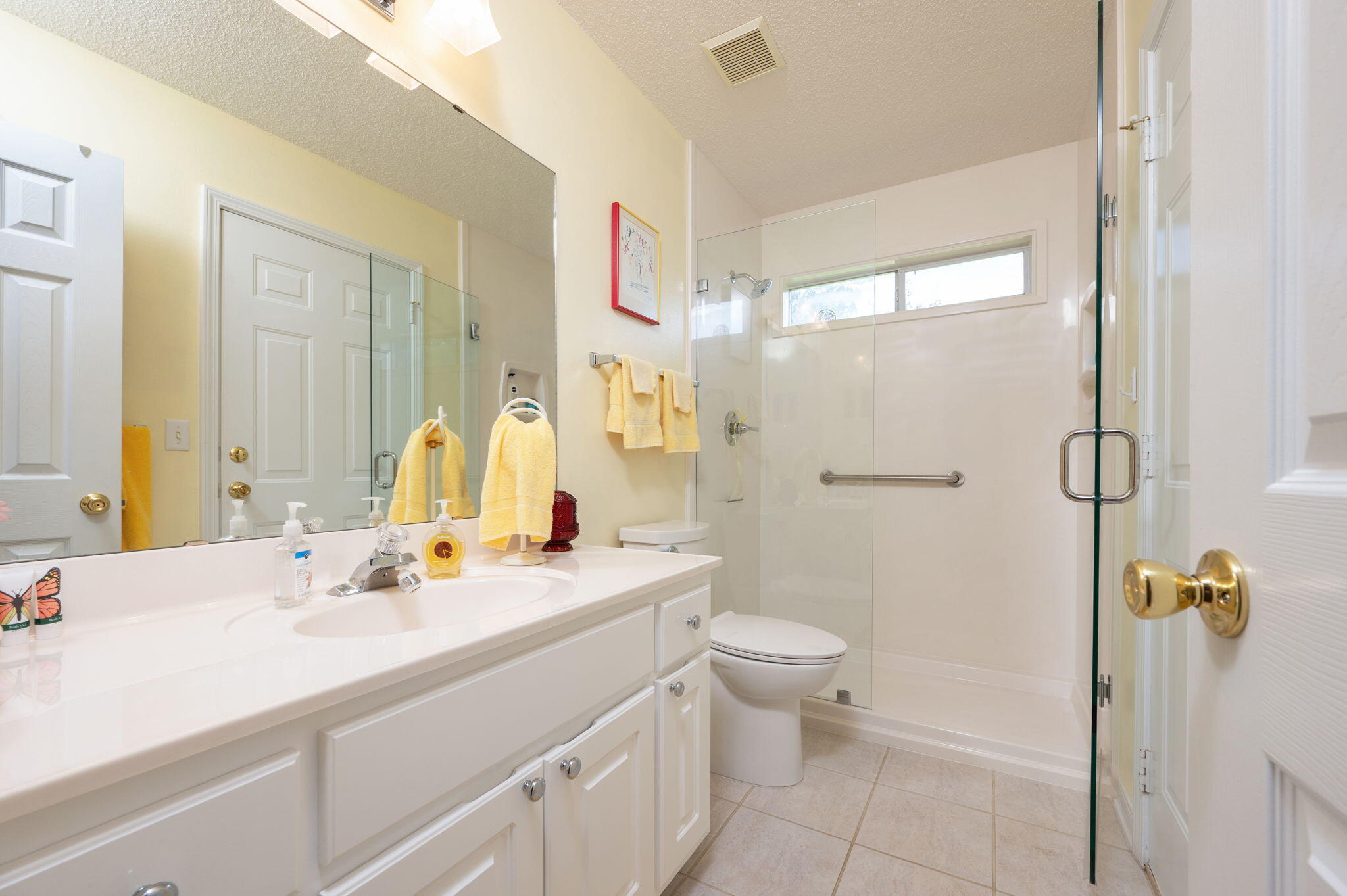 5863 Hunting Meadows Drive Crestview, FL 32536 - Photo 15 of 49 a bathroom with a sink toilet and shower