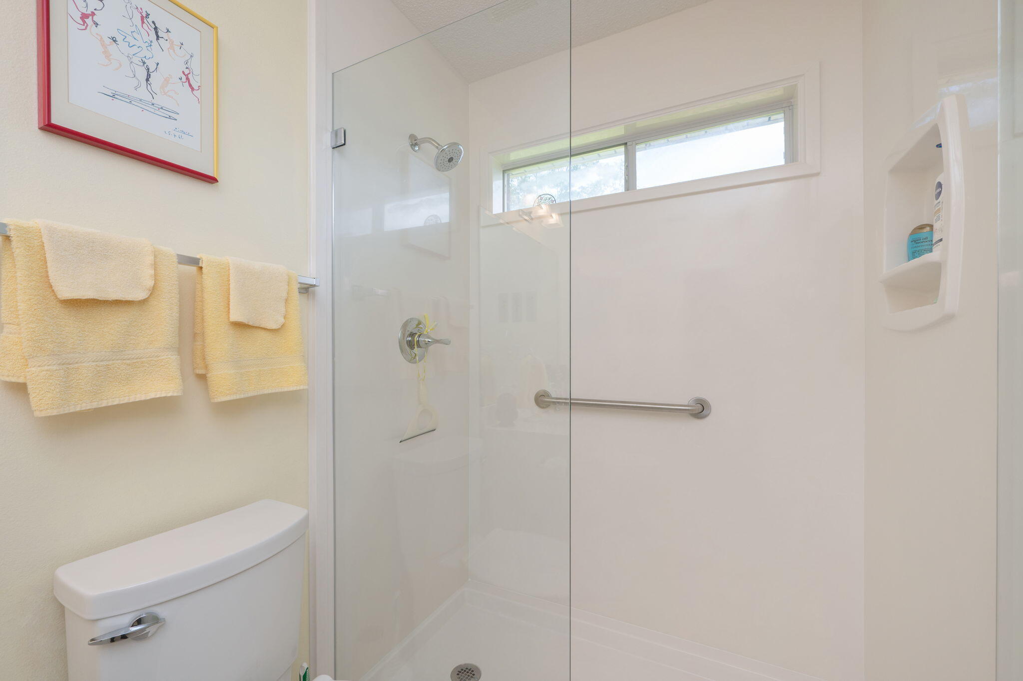 5863 Hunting Meadows Drive Crestview, FL 32536 - Photo 16 of 49 a bathroom with a shower a toilet and sink