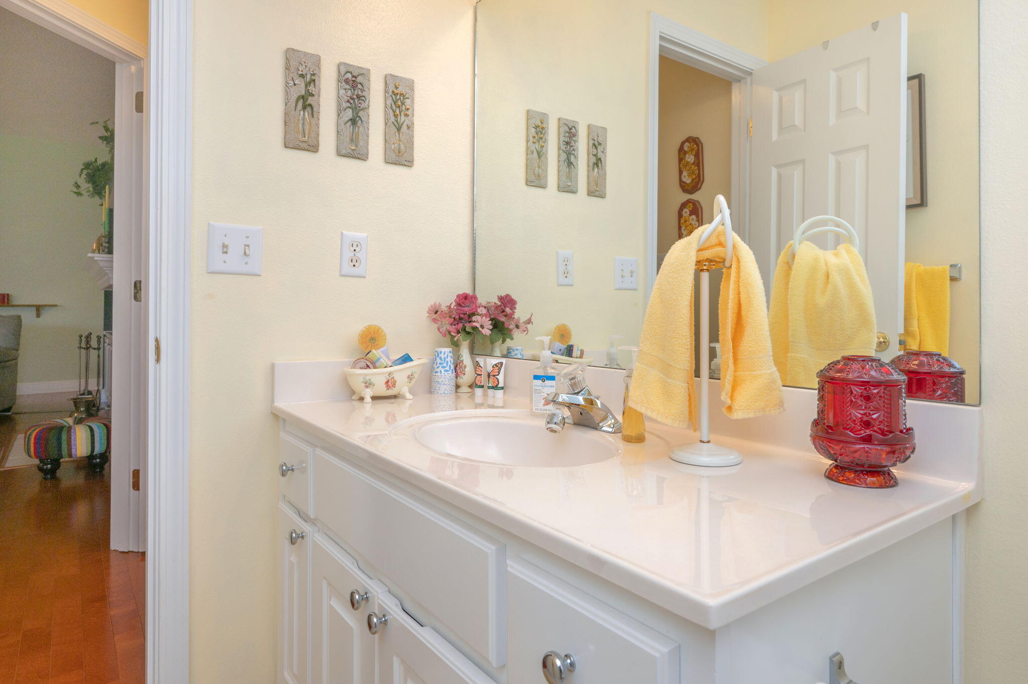 5863 Hunting Meadows Drive Crestview, FL 32536 - Photo 17 of 49 a bathroom with a sink vanity and a mirror