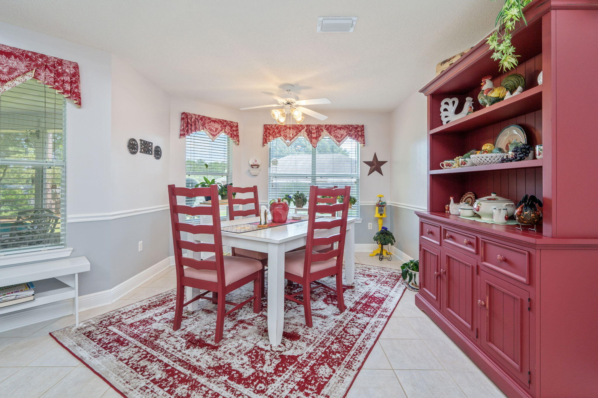 5863 Hunting Meadows Drive Crestview, FL 32536 - Photo 34 of 49 a view of a dining room with furniture