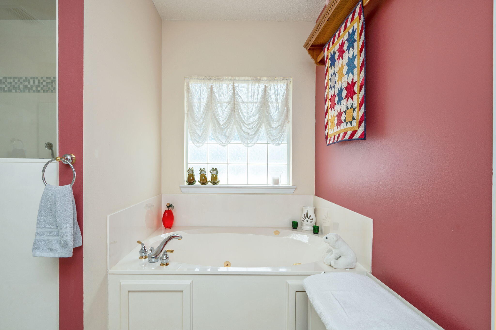 5863 Hunting Meadows Drive Crestview, FL 32536 - Photo 40 of 49 a bathroom with a sink and a bathtub