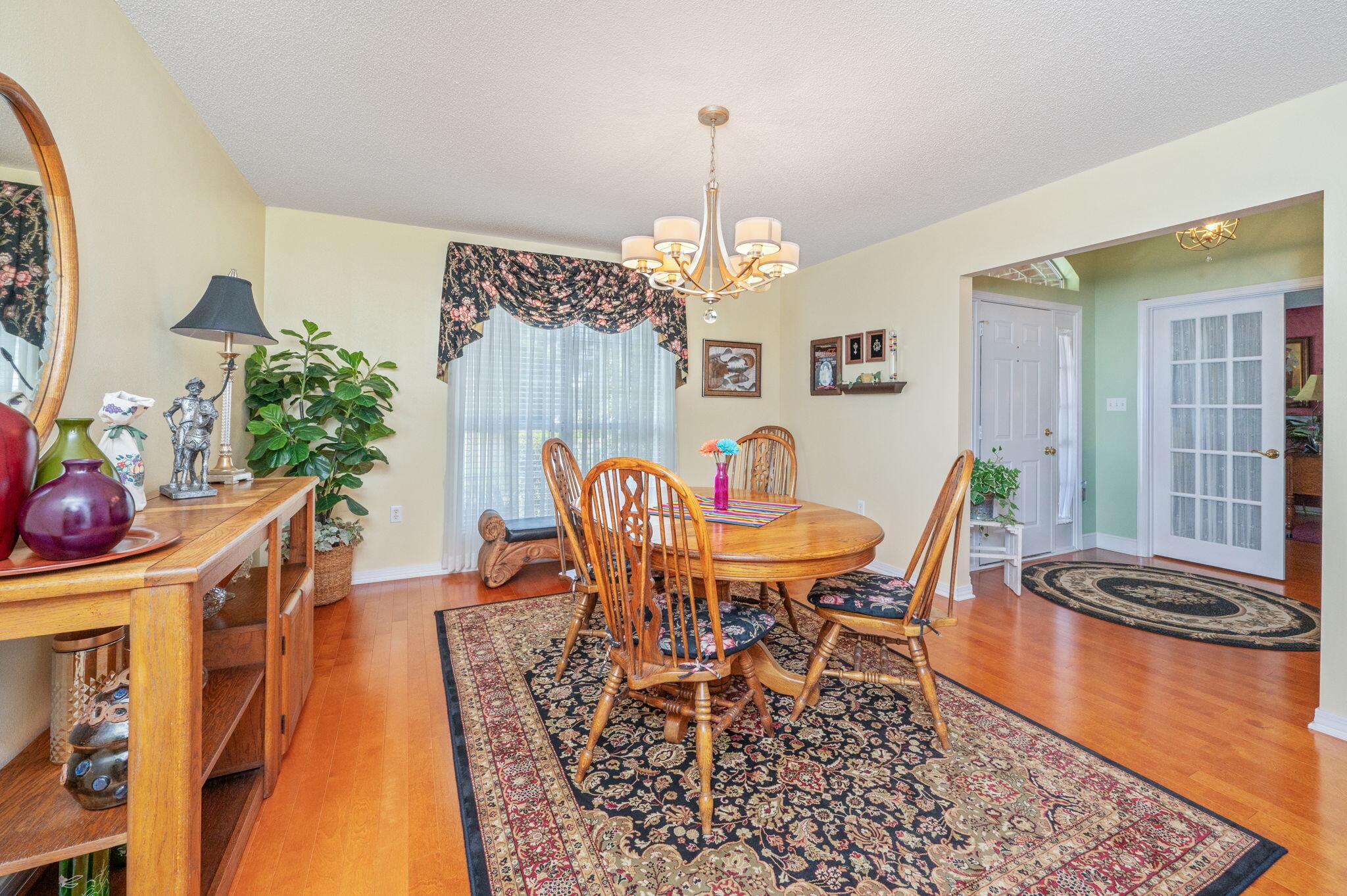 5863 Hunting Meadows Drive Crestview, FL 32536 - Photo 7 of 49 a dining room with furniture and window
