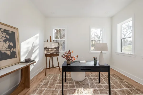 a room with furniture and a window