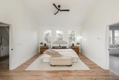 a view of an entryway with wooden floor