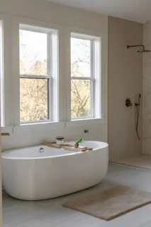 a view of a utility room with cabinets