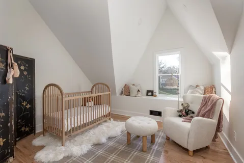 a view of a porch with furniture and garden view