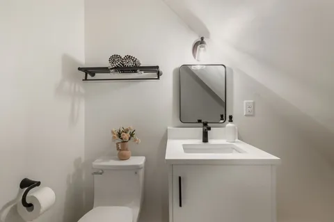 a view of balcony with deck and wooden floor