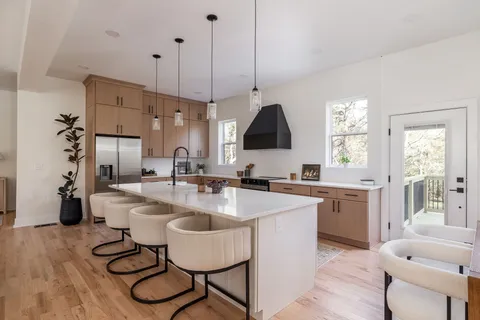 a kitchen with a stove and a microwave