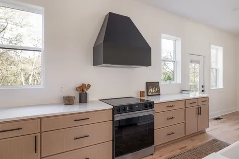 a very nice looking dining room with a table and chairs