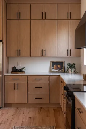 a kitchen with a stove and a microwave