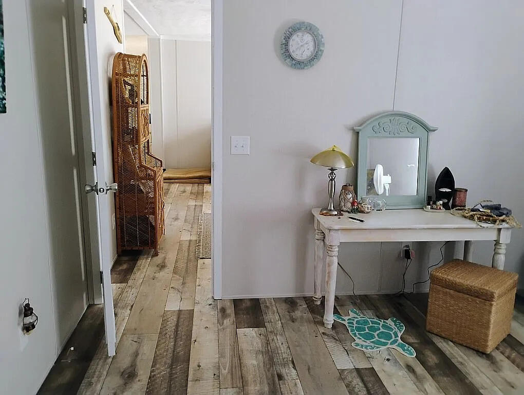 650 Satellite Road Graceville, FL 32440 - Photo 19 of 23 a bathroom with a sink and a mirror