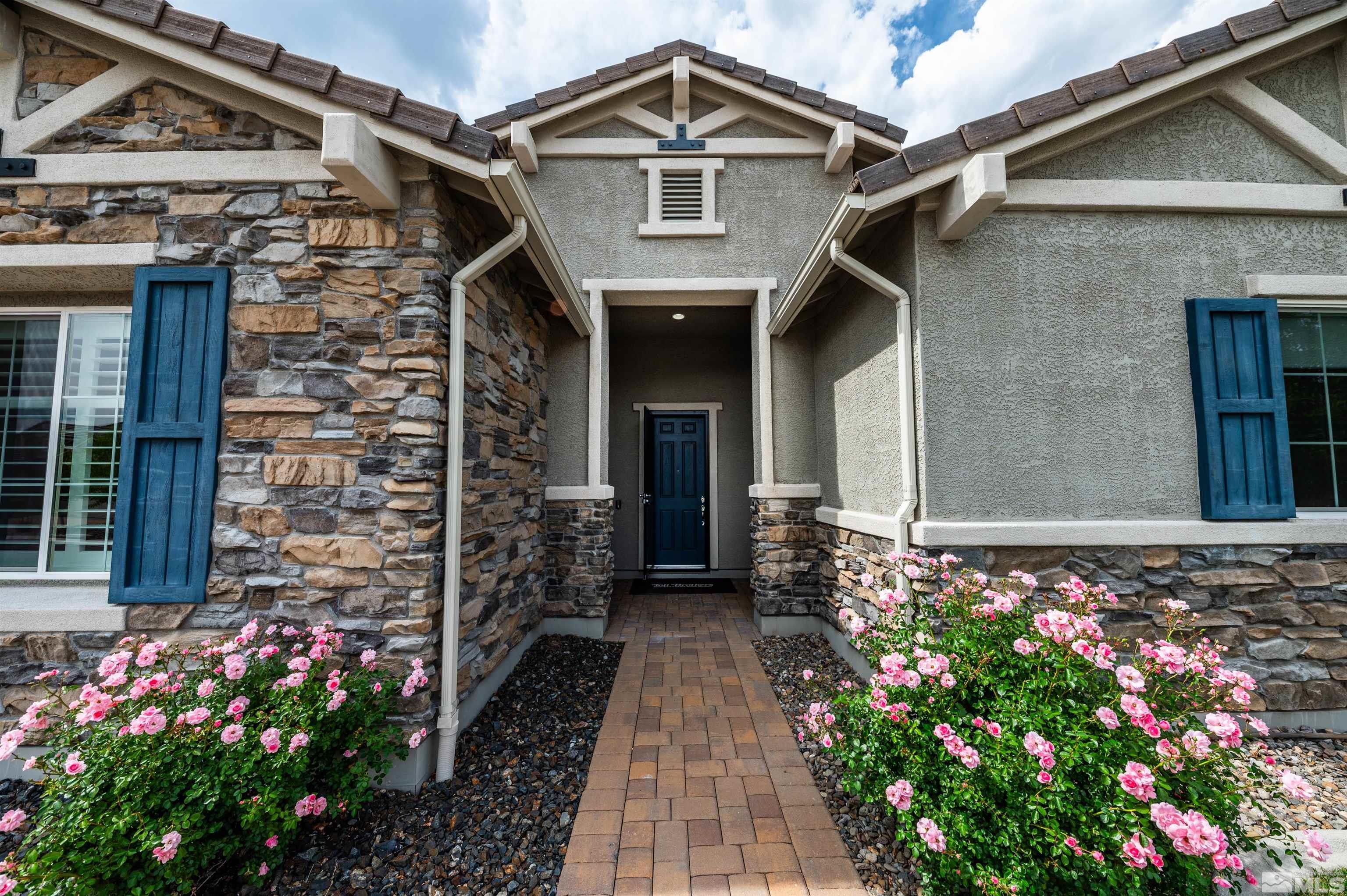 2305 Trakehner Lane Reno, NV 89521 - Photo 4 of 40 a front view of a house