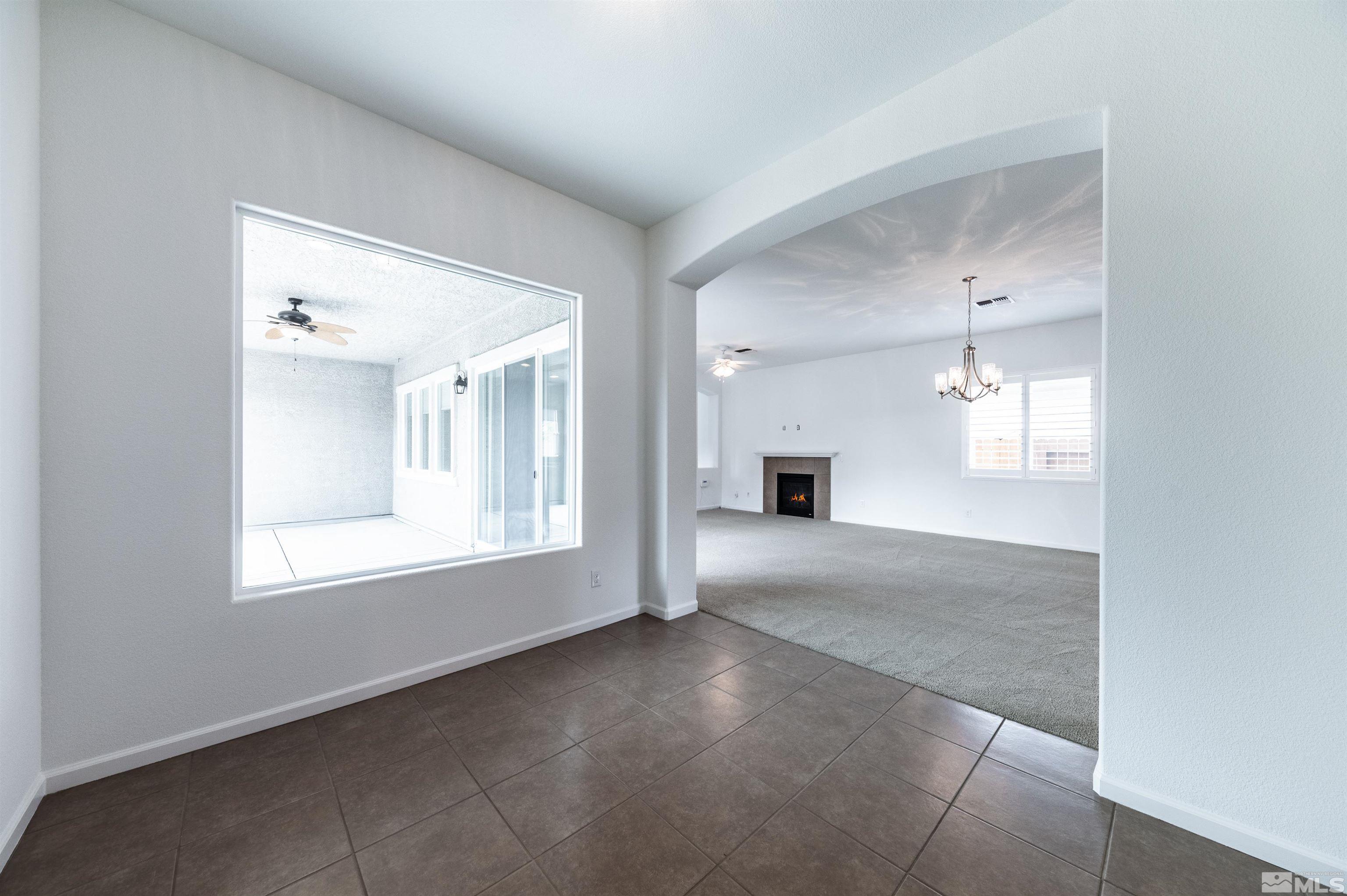 2305 Trakehner Lane Reno, NV 89521 - Photo 5 of 40 a view of an empty room with a window