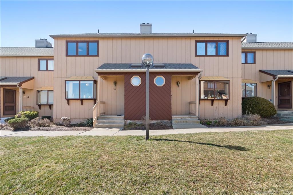 199 Skyview Drive, Unit 199 Cromwell, CT 06416 - Photo 1 of 1 a front view of a house with garden