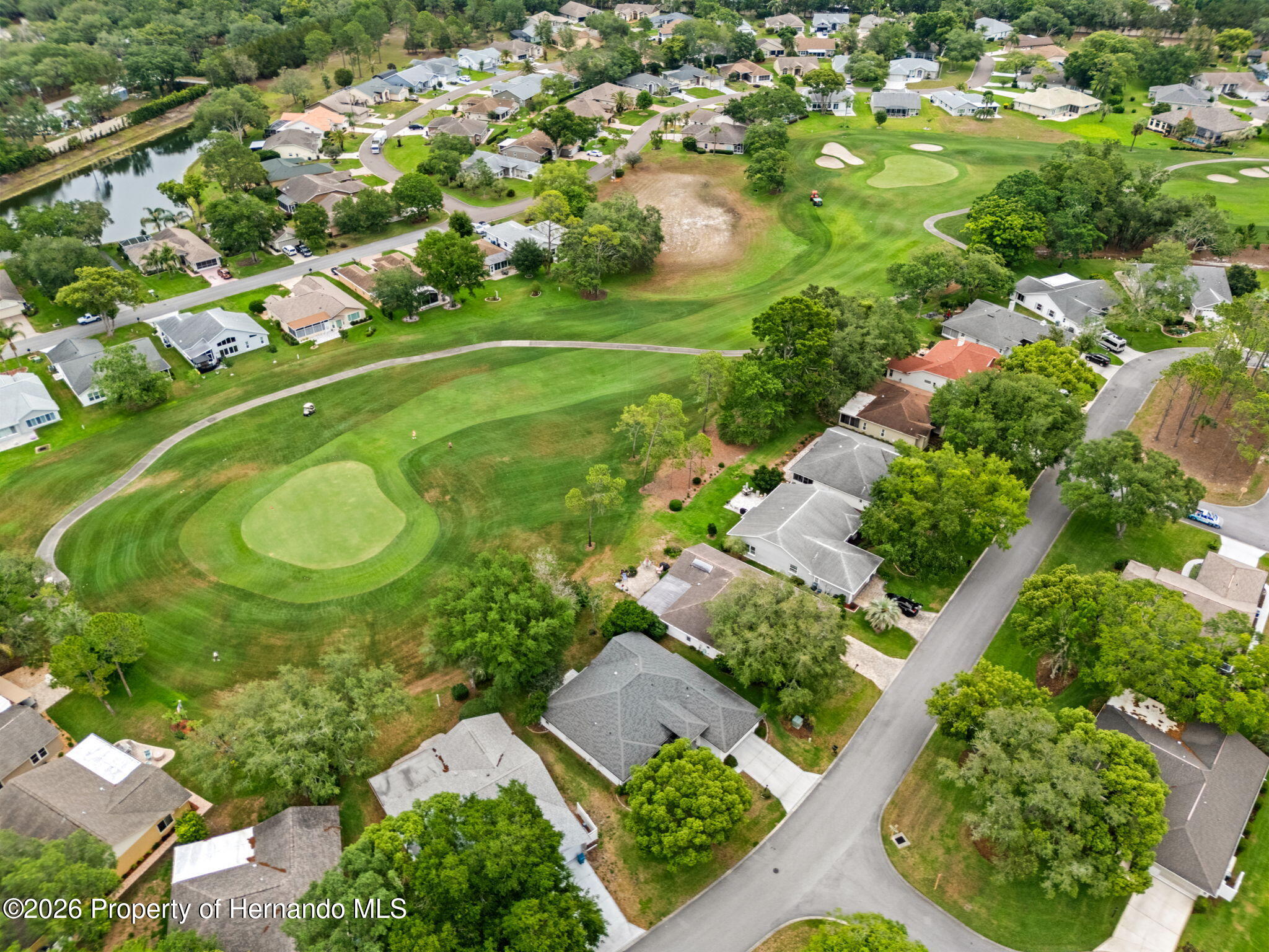 3072 Eagle Bend Road Spring Hill, FL 34606 - Photo 59 of 115 Aerial View of the Green behind the home.