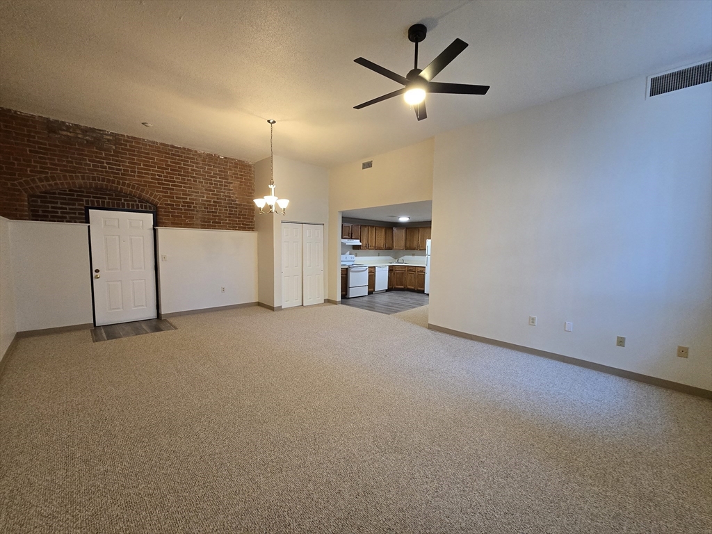147 Rawson Road, Unit G3 Quincy, MA 02170 - Photo 4 of 20 a view of a livingroom with a fireplace