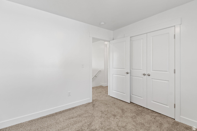 1269 West 500 South Logan, UT 84321 - Photo 18 of 19 Neutral color palette featuring light beige carpet and white walls