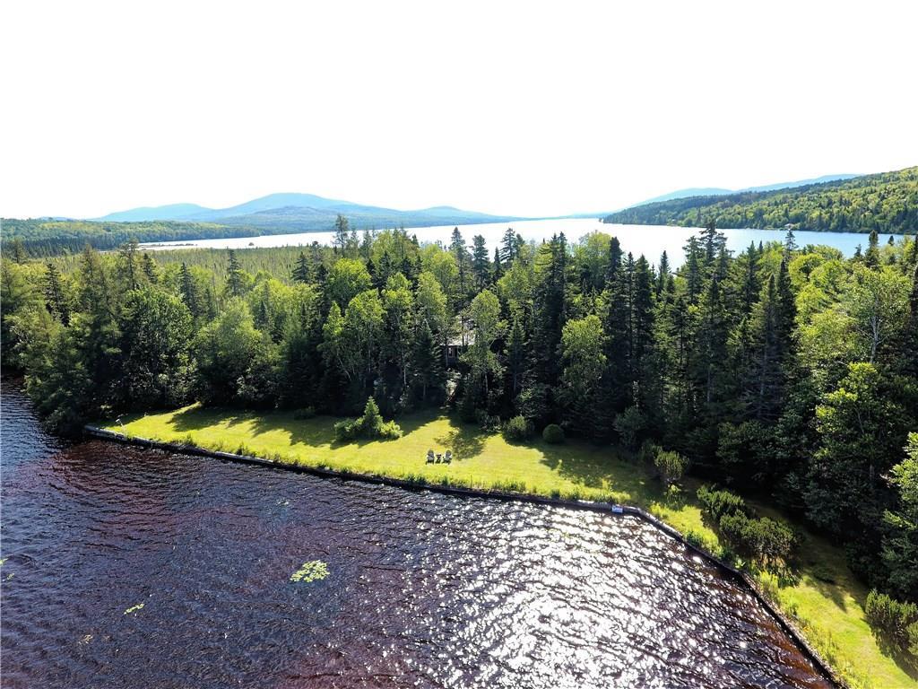 1838 Kennebago River Road Rangeley, ME 04970 - Photo 13 of 35 Lakefront Yard with Main Cabin in center
