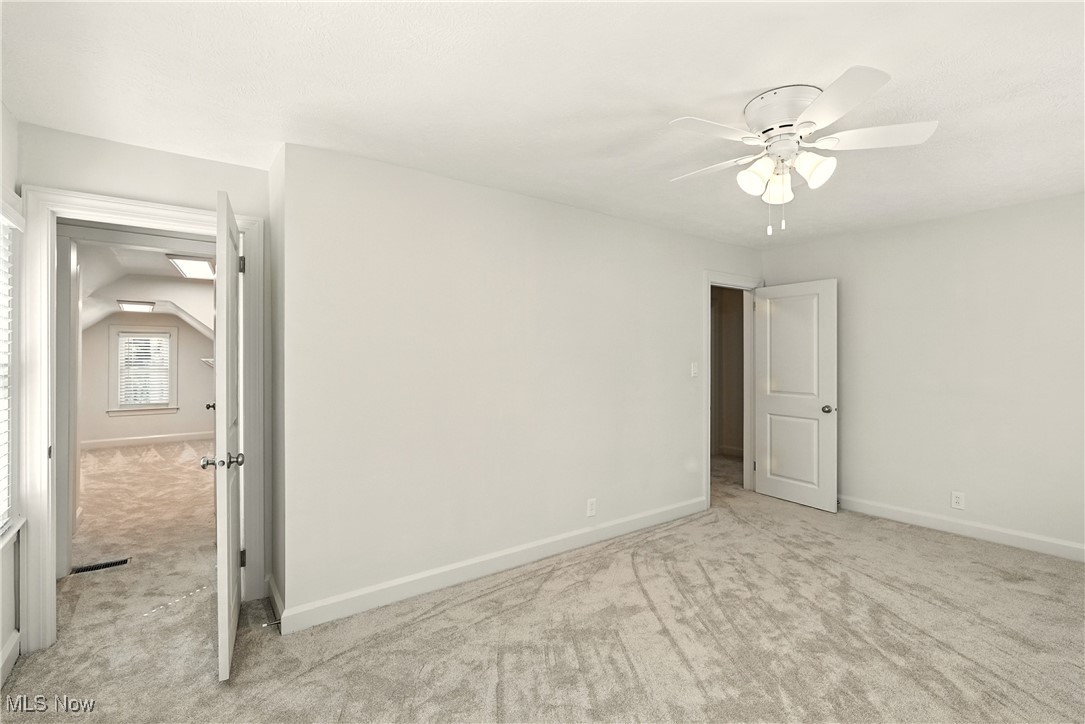 2844 Kent Road Stow, OH 44224 - Photo 31 of 47 Unfurnished bedroom with light carpet and ceiling fan
