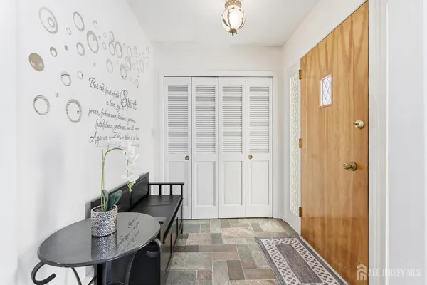 a view of a livingroom with furniture and window