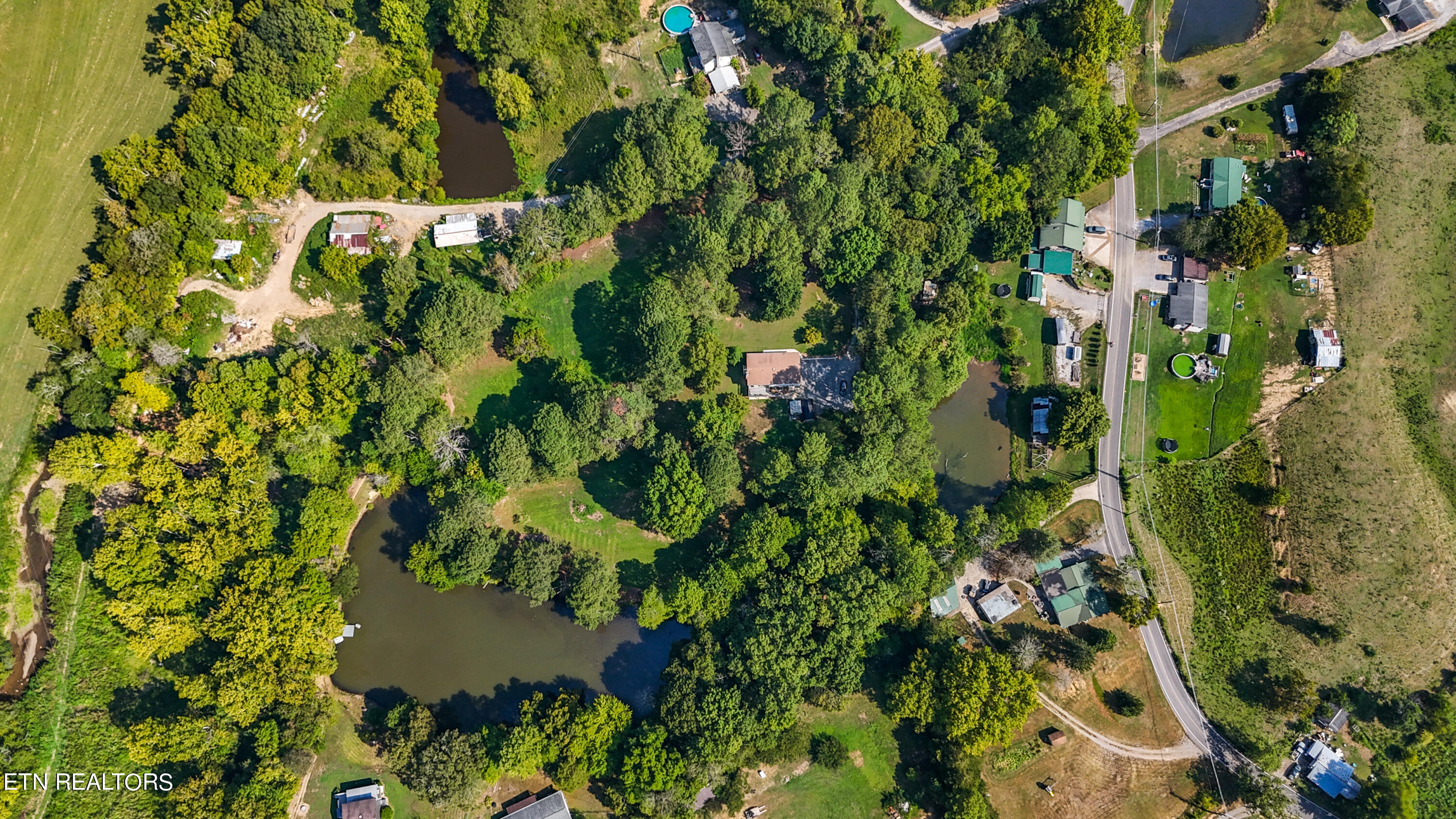 179 Smith Road Clinton, TN 37716 - Photo 5 of 38 Aerial of pond and land
