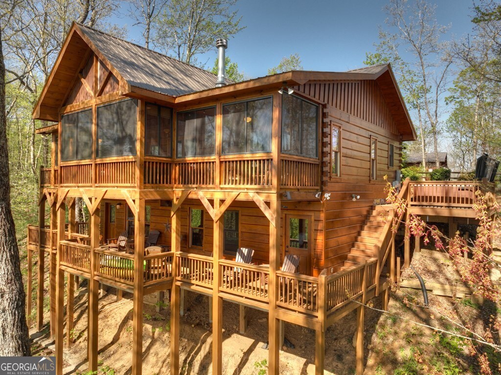 783 North Moreland Drive North Blue Ridge, GA 30513 - Photo 6 of 54 front view of a house with a yard